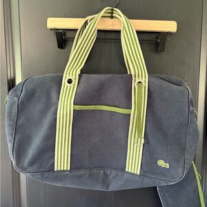 Lacoste Blue Canvas Tote Bag with Green White Striped Handles and Small Pouch